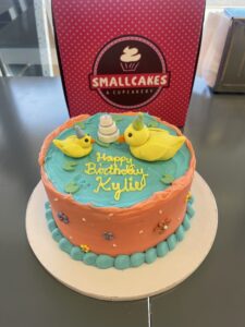 cake with two yellow ducks on it