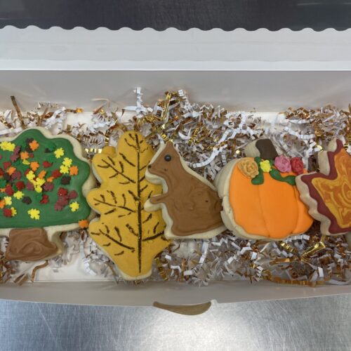 Holiday fall cookies a tree a leaf a squirrel a pumpkin and another leaf