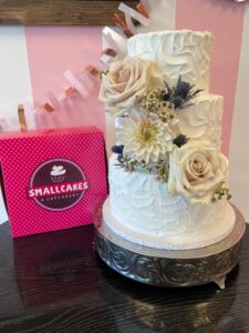 wedding cake with smallcakes box in the background